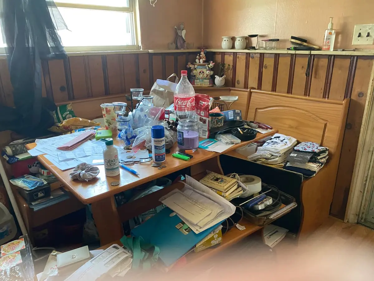Selling without a realtor in Babylon: kitchen counters buried in bottles and papers